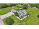 Aerial view showcasing a well-maintained home, lush lawn, and convenient circular driveway at 1609 Bridgebrook Ln., Conway, SC 29527