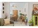 Dining area with a wood table, chairs, and a hutch with lots of natural light from the windows at 1609 Bridgebrook Ln., Conway, SC 29527