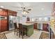 Bright kitchen features stainless steel appliances, a large island, and abundant cabinet space at 1609 Bridgebrook Ln., Conway, SC 29527