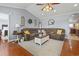Spacious living room boasts hardwood floors, vaulted ceilings, and an inviting seating arrangement at 1609 Bridgebrook Ln., Conway, SC 29527