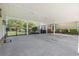 Covered outdoor patio featuring a grill, seating area, and view of the fenced yard with pergola at 1609 Bridgebrook Ln., Conway, SC 29527