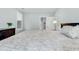Bedroom features a coordinating side table and dresser and en-suite bathroom at 179 Golden Bear Dr. # C4, Pawleys Island, SC 29585