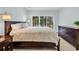 Light filled bedroom with a large sliding glass door to the outside and beautiful views at 179 Golden Bear Dr. # C4, Pawleys Island, SC 29585
