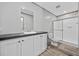 Bright bathroom featuring a vanity, shower, toilet, and wood-look flooring at 1962 Pint Circle, Longs, SC 29568