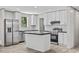Kitchen featuring white cabinets, stainless steel appliances, and an island at 1962 Pint Circle, Longs, SC 29568