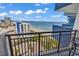 View from the balcony of the Atlantic ocean, sandy beach, and buildings at 2001 S Ocean Blvd. # 1504, Myrtle Beach, SC 29577