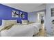 Bright bedroom with two beds and colorful accent wall with ensuite access at 2001 S Ocean Blvd. # 1504, Myrtle Beach, SC 29577