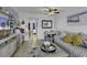 Nicely decorated living room with tile floors, dining table and couch at Bluewater Resort #1504 at 2001 S Ocean Blvd. # 1504, Myrtle Beach, SC 29577