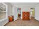 Bedroom featuring natural light, neutral walls, and wood drawers for extra storage at 203 Warbler St., Georgetown, SC 29440