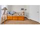 Bedroom with twin bed and storage drawers underneath and a simple lamp and nightstand at 203 Warbler St., Georgetown, SC 29440