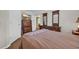 Comfortable bedroom featuring dark wood furniture and a cozy, inviting aesthetic at 203 Warbler St., Georgetown, SC 29440