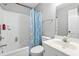 Bathroom featuring a shower/tub combo with a blue patterned shower curtain at 204 Elm St., Johnsonville, SC 29555