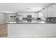 Kitchen with stainless steel appliances, granite countertops and a breakfast bar at 204 Elm St., Johnsonville, SC 29555