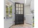 Interior shot of laundry room with exterior view of front porch at 204 Elm St., Johnsonville, SC 29555