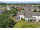 Beautiful aerial view of the home featuring a well maintained backyard, patio, and lush greenery at 205 Threshing Way # 1052, Myrtle Beach, SC 29579