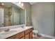 Bathroom featuring a double vanity sink with a toilet and glass door shower at 205 Threshing Way # 1052, Myrtle Beach, SC 29579
