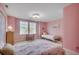 Pink bedroom featuring two twin beds and a window at 205 Threshing Way # 1052, Myrtle Beach, SC 29579