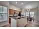 Modern kitchen featuring stainless steel appliances, countertop seating, and a dining area at 205 Threshing Way # 1052, Myrtle Beach, SC 29579