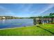 Picturesque lake view from the community pier, showcasing serene water and lush green surroundings at 205 Threshing Way # 1052, Myrtle Beach, SC 29579