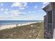 Enjoy picturesque beach views from this condo balcony, perfect for sunset watching and relaxation at 208 Ocean Blvd. N # 324, North Myrtle Beach, SC 29582