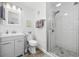 This updated bathroom features a modern vanity and glass-enclosed walk-in shower at 208 Ocean Blvd. N # 324, North Myrtle Beach, SC 29582