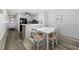 Open kitchen and dining area, with modern appliances and stylish decor at 208 Ocean Blvd. N # 324, North Myrtle Beach, SC 29582