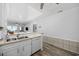 Bright kitchen with a breakfast bar, stainless steel sink, and open layout at 208 Ocean Blvd. N # 324, North Myrtle Beach, SC 29582