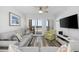 Cozy living room boasts access to a balcony with ocean views at 208 Ocean Blvd. N # 324, North Myrtle Beach, SC 29582