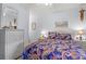 Comfortable bedroom featuring wicker furniture, colorful bedding, and coastal-themed decor at 210 25Th Ave. S # 19, Myrtle Beach, SC 29577