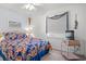 Inviting bedroom featuring a decorative paisley comforter set, a ceiling fan, and a window with blinds at 210 25Th Ave. S # 19, Myrtle Beach, SC 29577