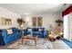 Inviting living room featuring comfortable denim seating, coastal decor, and a bright, airy ambiance at 210 25Th Ave. S # 19, Myrtle Beach, SC 29577