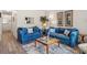 Inviting living room featuring comfortable denim couches and coastal decor at 210 25Th Ave. S # 19, Myrtle Beach, SC 29577