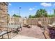 Outdoor patio with multiple seating arrangements, privacy fence, and lush greenery at 210 25Th Ave. S # 19, Myrtle Beach, SC 29577