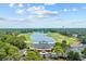 Overhead shot of the clubhouse overlooking a lake and the golf course at 2150 North Berwick Dr., Myrtle Beach, SC 29575