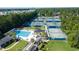 Aerial image of the community pool, tennis courts, and surrounding landscape at 2150 North Berwick Dr., Myrtle Beach, SC 29575