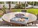 Outdoor dining and entertaining around a built-in fire pit at 2150 North Berwick Dr., Myrtle Beach, SC 29575