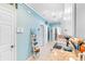 Galley kitchen showcasing white cabinets, granite counters, and stainless appliances at 230 Addison Cottage Way, Murrells Inlet, SC 29576