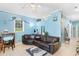 Comfortable living room with tile floors, a sectional sofa, and a bright, open feel at 230 Addison Cottage Way, Murrells Inlet, SC 29576