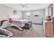 Comfortable bedroom with natural light, carpeted floor, and ceiling fan at 232 Je Edward Dr. # 19, Myrtle Beach, SC 29588