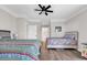 Bedroom featuring two beds, wood floors, and crown molding at 232 Je Edward Dr. # 19, Myrtle Beach, SC 29588