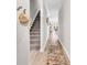 Hallway features hardwood floors and a staircase, creating an inviting entrance to the home's upper level at 232 Je Edward Dr. # 19, Myrtle Beach, SC 29588
