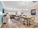 Inviting living room featuring wood floors, and an open dining area, perfect for gatherings and entertaining at 232 Je Edward Dr. # 19, Myrtle Beach, SC 29588
