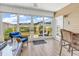 Cozy sunroom with wicker furniture and views of the backyard at 232 Je Edward Dr. # 19, Myrtle Beach, SC 29588