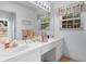 Bathroom with dual vanity, sinks, and ample mirror space at 250 Nature Trail, Little River, SC 29566