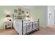 Light and airy bedroom with metal bed frame, offering a peaceful retreat with natural light at 250 Nature Trail, Little River, SC 29566
