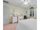 Bright, well-lit bedroom offering natural light through its large window with floral curtains at 250 Nature Trail, Little River, SC 29566