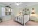Calm bedroom featuring a metal-frame bed, soft lighting, and a serene atmosphere at 250 Nature Trail, Little River, SC 29566