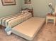 Cozy bedroom featuring twin beds, neutral carpet, and a light-filled ambiance at 250 Nature Trail, Little River, SC 29566