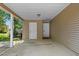 Carport with two entry doors and ample parking space at 250 Nature Trail, Little River, SC 29566