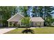 Charming single-story home featuring a covered carport and a well-manicured lawn at 250 Nature Trail, Little River, SC 29566